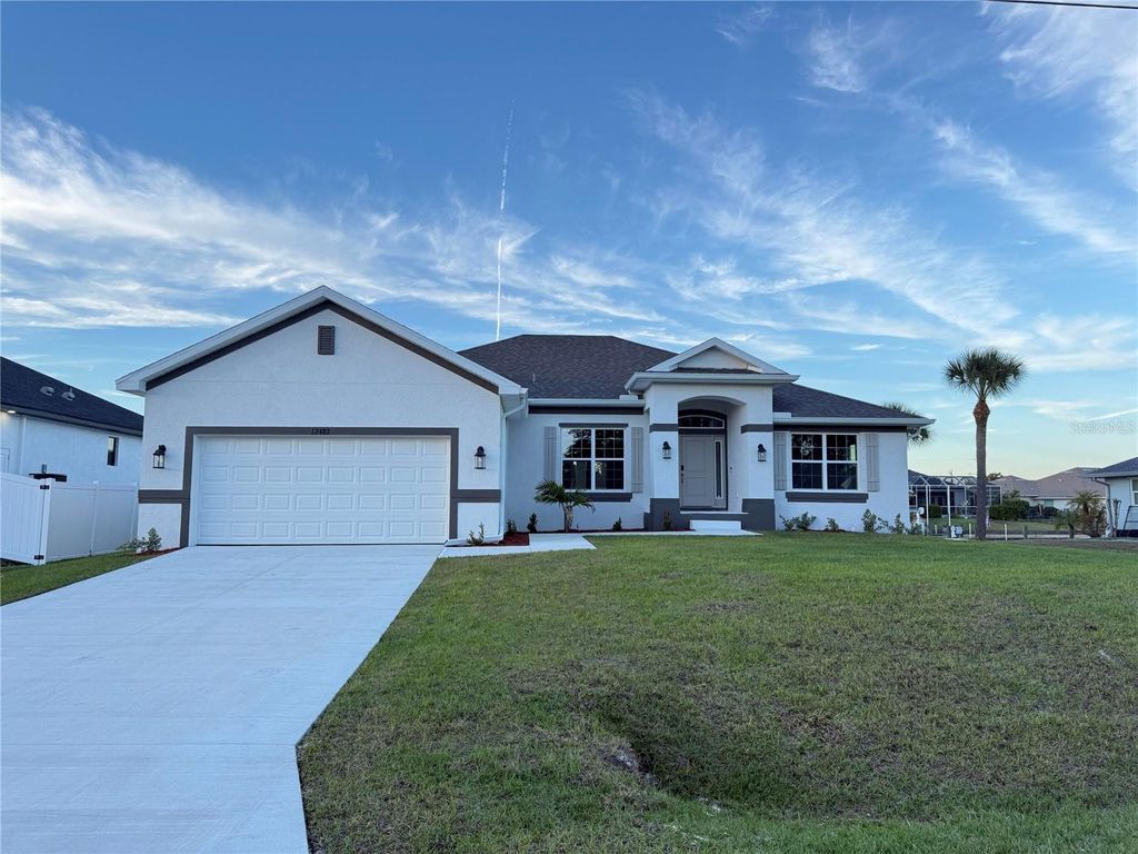 Photo of 12482 Kneeland Terrace, Port Charlotte, FL 33981 (MLS # O6368082)