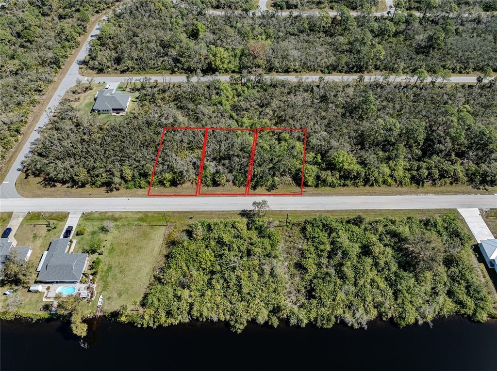 Photo of 2190 Cornelius Boulevard, Port Charlotte, FL 33953 (MLS # N6132324)
