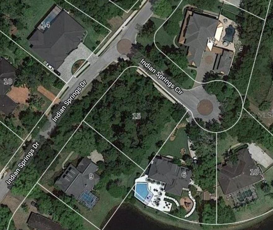 Imagine building your dream home in one of Ormond's most sought after hidden gems, Indian Springs. With only 20 homesites and just 2 remaining, this gated community offers a quiet, private setting surrounded by beautiful custom homes. This flat, east to build half acre lot means less prep and more times bringing you vision to life. Tucked away, yet just minutes from I-95, shopping, dining, hospital, and the beach. You'll enjoy both serenity and convenience. Gate access is required.