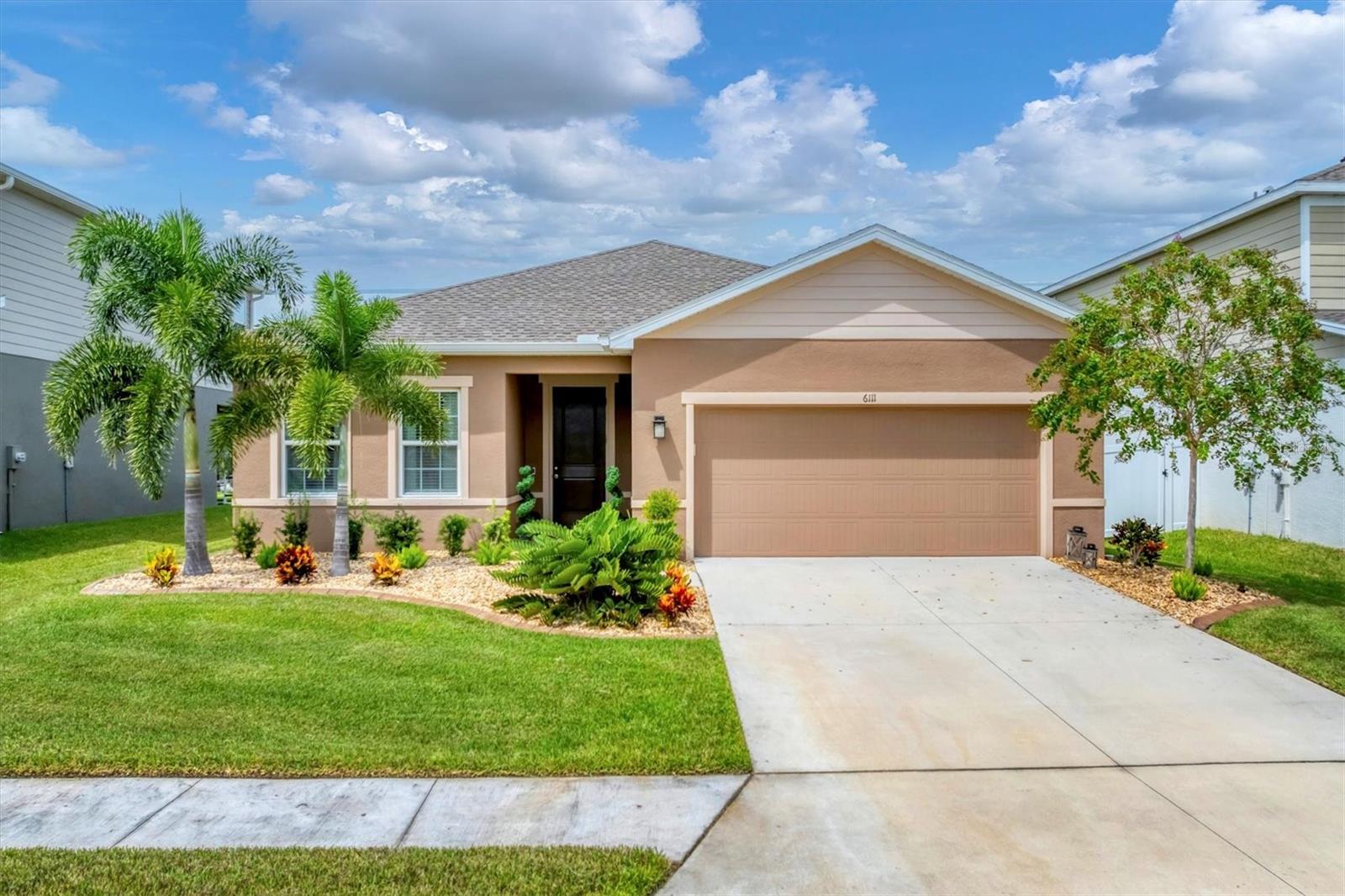 Located within Willowbend in the "Reserve" neighborhood, this Baymont floorplan is beautifully finished. Seller selected the builder's top tier finishes throughout. Here's what you will love-outside, the landscaping and curbing with landscaping stone for easy maintenance. Inside, Luxury vinyl plank flooring flows through the high traffic areas for maintenance ease. Top level Quartz countertops and top-level wood cabinets for durability. Did I mention there is NO CDD and LOW HOA fees. More reasons to fall in love with this home. The community pool and playground are close by. The calming water views from the great room, dining and primary bedroom. Located in Parrish near Publix, Aldi, Lowe's and Home Goods; close to I-75 and 275 making travel to anywhere easy.
