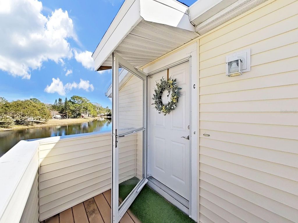 Photo of 129 Camphor Circle #C, Oldsmar, FL 34677 (MLS # TB8474438)