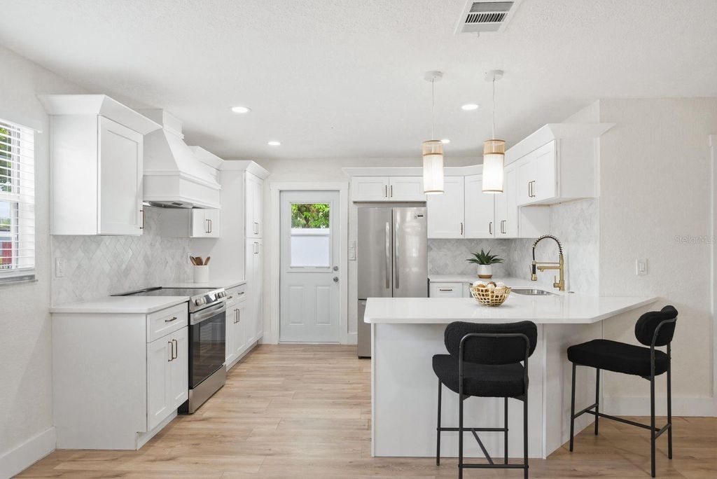 Photo of 4438 W Wyoming Avenue, Tampa, FL 33616 (MLS # TB8500049)