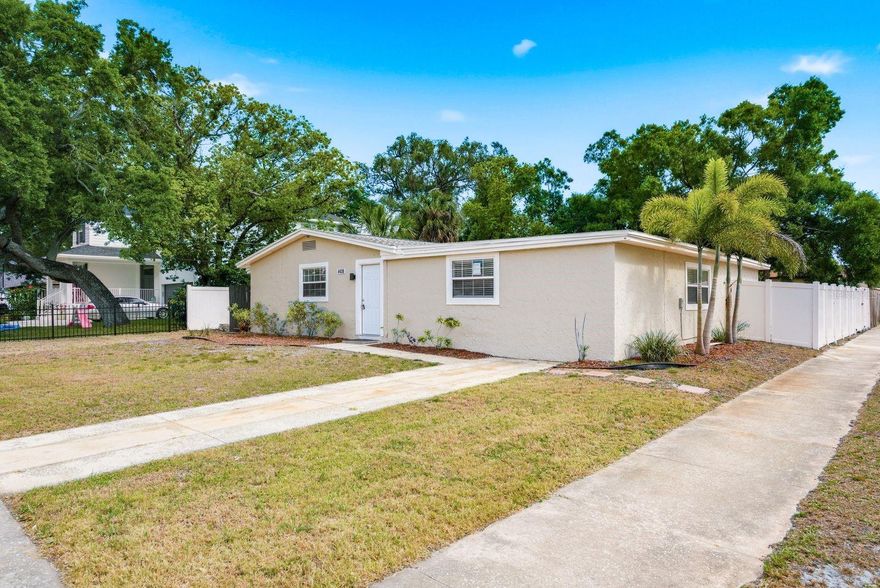 Bring your offers! COMPLETELY remodeled Tampa home with NO HOA and NEVER flooded through the past two hurricanes—offering peace of mind along with modern updates. Situated on a spacious CORNER LOT, this property features a NEW FENCE, side gate, and room for BOAT PARKING.

Step inside to a bright, open layout with updated flooring, fresh interior and exterior paint, a custom accent wall, and stylish boho-inspired lighting. The home offers multiple living spaces, including a BONUS living room—perfect for entertaining, relaxing, or creating a separate hangout area.

The kitchen flows seamlessly into the main living space and showcases quartz countertops, stainless steel appliances, a beautiful custom vent hood, tile backsplash, and a partial island with seating, plus a dedicated formal dining area for both casual and traditional dining.

The primary suite features a huge walk-in closet and an additional BONUS room ideal for a home office, nursery, or private retreat. You’ll also love the oversized laundry room with butcher block countertops and abundant cabinetry.

Major updates include a 2024 shingle and flat roof and a NEW WATER HEATER, adding even more value. The exterior offers a clean slate with plenty of potential to enhance curb appeal and make it your own.

Move-in ready with thoughtful upgrades, flexible space, and a prime Tampa location—this one stands out.