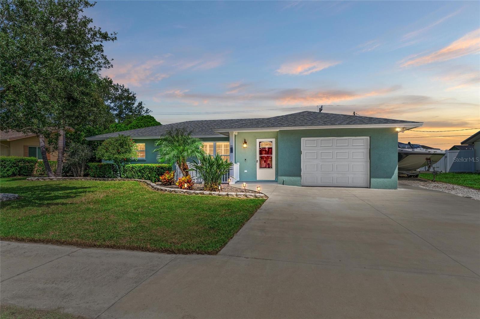 One or more photo(s) has been virtually staged. Beautiful move-in ready home with one of the most desirable floor plans in West Bradenton. With an easy flow from room to room and 1,799 sq ft of living area, the home offers a spacious split bedroom floor plan providing 4 bedrooms, 3 full baths, bonus room/office, ceramic tile flooring, one car garage, parking pad for a boat/RV/company truck, screened-in saltwater heated swimming pool with covered lanai, large storage shed and fenced yard. This spotless property has many recent updates with all the "big-ticket" items already completed for you, including a new roof in December 2024, new vinyl fence, new A/C unit with UV light, updated kitchen, recessed lighting and hurricane shutters for all windows. Enjoy cooking your favorite meals in the beautifully designed kitchen with granite counters, 42” solid wood cabinets, under cabinet lights, soft-close drawers, pull-out pantry drawers, dual lazy-susan corner cabinets, travertine backsplash, stainless steel appliances including a new dishwasher and stove with double oven, breakfast bar and passthrough window to the dining area. The primary bedroom is outfitted with an ensuite bathroom, walk-in closet, direct access to the pool area, plus a bonus room that could be used as an office, extra closet, exercise or lounge area. The split floor plan offers three additional bedrooms and two additional bathrooms, providing privacy for your family and guests. Outside you will fall in love with the saltwater heated swimming pool for fun pool parties, swimming laps or relaxing while soaking in the sun. The fenced backyard allows you to let your pets run freely and includes a private covered patio for BBQs and entertaining. The backyard also provides 3 different fruit trees including Avocado, Barbados cherry and Ponderosa lemon tree, plus a storage shed with two separate rooms, which is perfect to store holiday items or gardening supplies and tools. On the side of the house you will find a fish cleaning station with running water and drain. The large one car garage is outfitted with a washer and dryer, epoxy flooring, cabinets and shelving. This property provides so much opportunity and could be perfect for someone who would like to entertain or to create rental income. No rental restrictions, no pet restrictions, no HOA or deed restrictions and is not located in a flood zone. Just a short distance to shopping, Fresh Market, Blake Hospital, post office, Publix, tasty restaurants, golfing, Robinson's Preserve, kayaking and the beautiful beaches of Anna Maria Island. This home has it all. Make your appointment today to see this amazing home!
