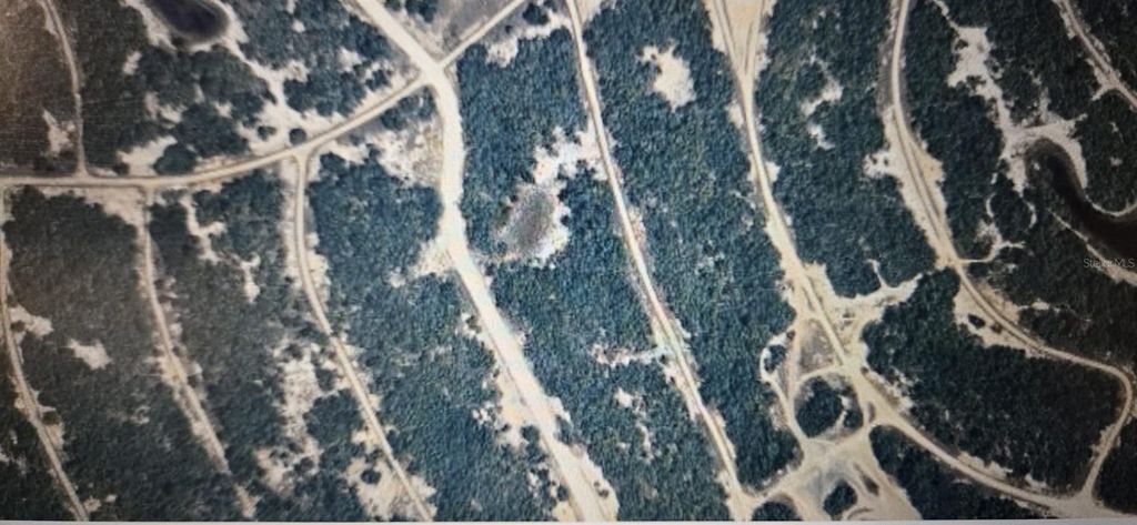 Photo of 240 Rhythm Drive, Lake Placid, FL 33852 (MLS # O6376730)