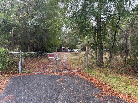 Photo of 11550 SE 32nd Place, Morriston, FL 32668 (MLS # OM714337)