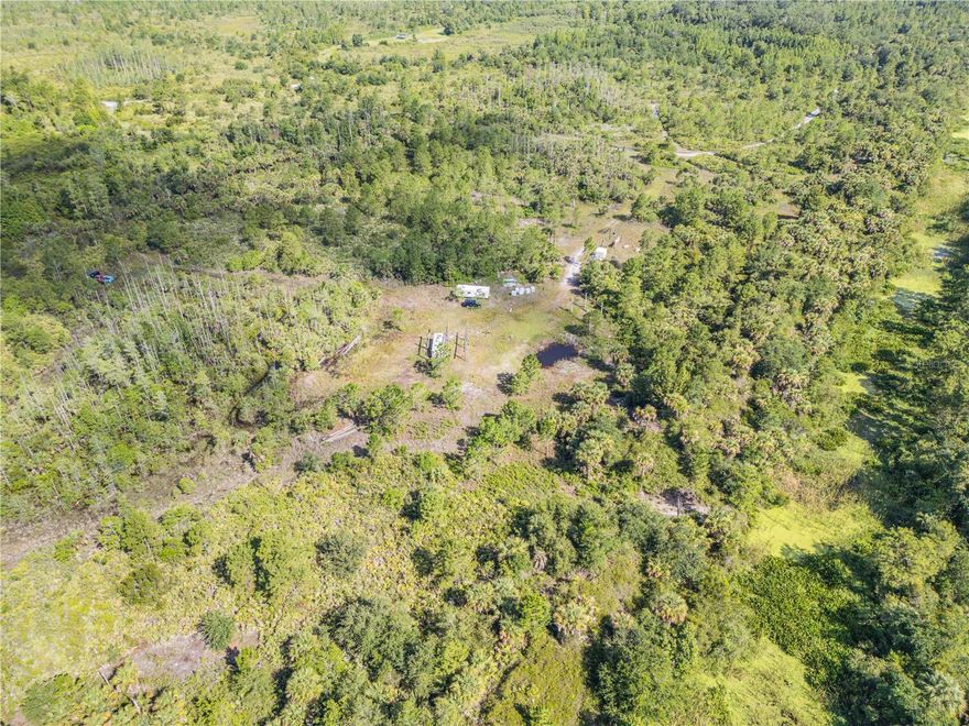 Discover 4 parcels totaling 10.31 acres of untouched Florida wilderness in Volusia County’s Resource Corridor (RC) zoning. This is a rare opportunity to own land focused on preserving natural beauty and habitat, ideal for land banking or a secluded recreational retreat.
Surrounded by the future Farmington / Deering Park communities, the property offers prime positioning without HOA restrictions. Access is gated and permitted by request via an unpaved road, best reached by four-wheel drive. No named road or utilities currently exist, maintaining its raw, natural character.
Current zoning supports low-intensity use and environmental preservation, offering long-term potential in a rapidly growing area.