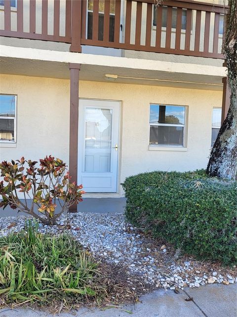 Photo of 4956 Harbor Villa Lane #103, New Port Richey, FL 34652 (MLS # W7883943)