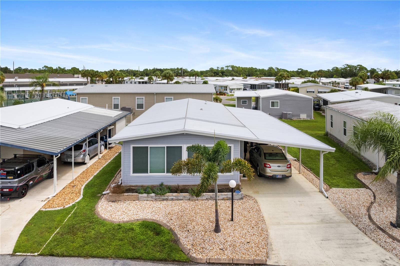A SUPER CURB APPEAL MOVE-IN-READY 2 bed 2 bath home to enjoy seasonally or full-time! NEW SIDING & SKIRTING, NEWER SUB-FLOOR AND FLOORING, NEW BLINDS! NEW ROOF was installed in 2017. Lifetime roof warranty (transferable to buyers!) NEW 1/2 ROOF replacement in 2023. NEW 2023 ROOF for carport, shed, and lanai! NEW A/C IN 2019! Membership with TriCounty Air transfers to new owners and is valid until January 2026!! NEWER WINDOWS & 4 impact windows replaced in 2015. Lifetime Warranty (transferable to buyer!) on windows, seals and screens. Vapor Barrier-- 2020! All tie-downs replaced in 2014. Contract with Truly Nolan Pest Control is fully paid for until September 2025! This home is as cute as a button, and it comes FURNISHED! Most furnishings, linens, and kitchen equipment are included. Your oasis is ready for you to move right in. Additionally, the golf cart and granny bike are also included. You can quite literally turn the key to the front door and begin your next chapter in Lazy River Village. Well-maintained and well-decorated, this is a dynamite home for a lucky new owner! You're going to love it!
Welcome to Lazy River Village! One of the premiere (if not THE best) 55+ waterfront manufactured park in all of Sarasota and Charlotte counties! The BEST amenities, clubs, and selection of activities you will find in any co-op park in all of Sarasota county and even Charlotte County. Lazy River is located on the banks of the beautiful Myakka River. Be prepared to enjoy Florida's wildlife at its finest! The spring training homes of both the Atlanta Braves & the Tampa Bay Rays are just a minutes away. The world-renowned Gulf of Mexico beaches are all within 30 minutes or less! 1) Englewood beach, 2) Casperson Beach (GREAT for shelling), 3) Venice Beach (shark tooth capital of the world), 4) Brohard Paw Park, 5) Nokomis beach (you've GOT to experience the weekly drum circles), 6) the island gem of southwest Florida: Boca Grande... And finally: 7) Siesta Key in Sarasota has been ranked multiple times as the number one beach in the nation and is a mere 35 minutes away. Lazy River Village offers a lifestyle that every retiree dreams of. You have the quaint downtowns of Venice and Punta Gorda--both cities are often ranked as Top 10 destinations in the country for retirement. Another local favorite, Englewood, is a cozy, fun beach town on the Gulf of Mexico. If you enjoy an abundance of activities, you will have plenty to choose from in Lazy River Village: Pickle ball, tennis, bike clubs, card clubs, and pontoon boating. They even have a professional woodworking shop. A low monthly fee of $246 includes all the amenities. There are other amenities for an extra fee, such as a marina slip if your home is not located on the water. The residents of Lazy River Village agree: Lazy River is a community that offers it all. Don't miss your chance to see this home!