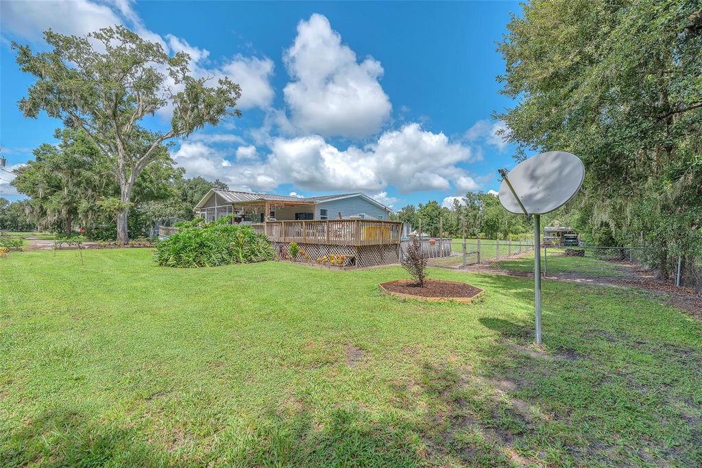 Photo of 4936 Steve Reeves Lane, Plant City, FL 33565 (MLS # A4664223)