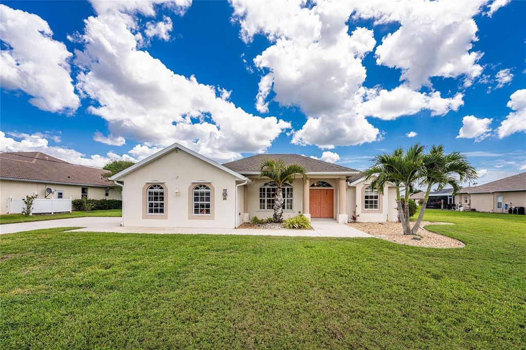 Photo of 438 Boundary Boulevard, Rotonda West, FL 33947 (MLS # D6146843)