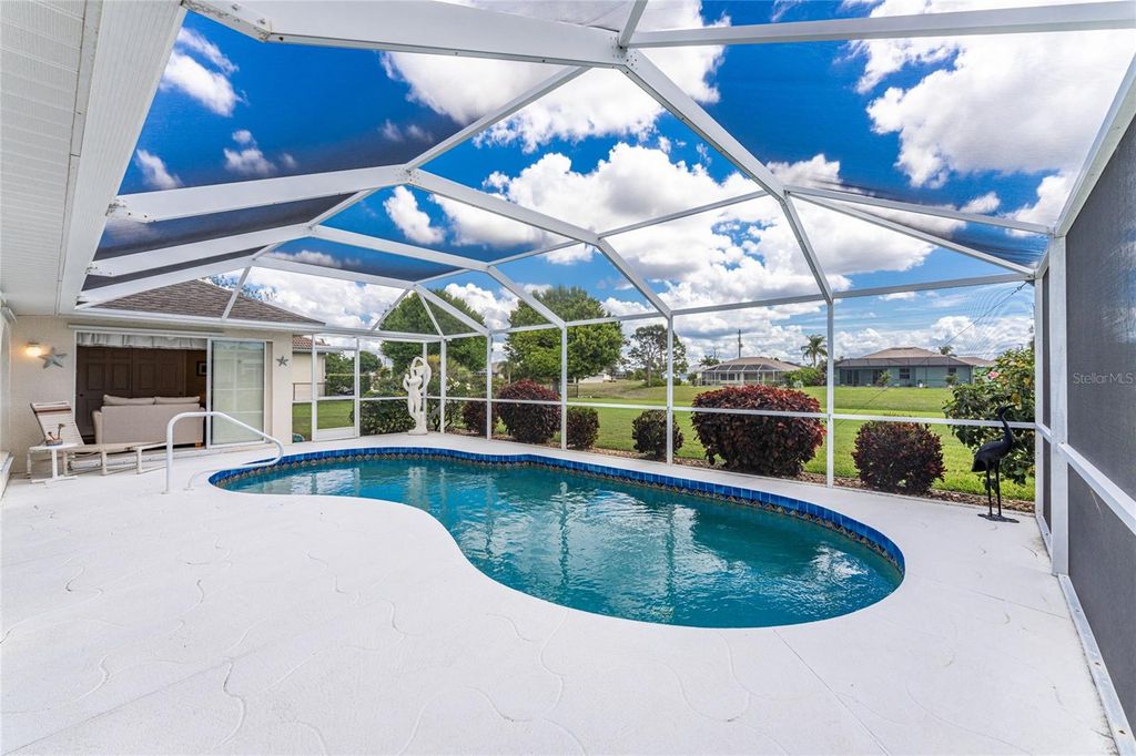 Photo of 438 Boundary Boulevard, Rotonda West, FL 33947 (MLS # D6146843)