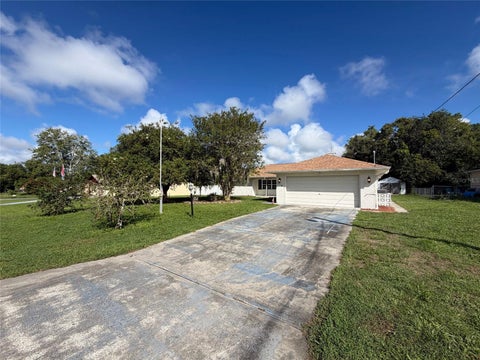Photo of 11187 Blythville Road, Spring Hill, FL 34608 (MLS # O6439621)