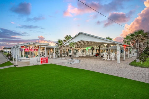 Photo of 1204 S Ocean Shore Boulevard, Flagler Beach, FL 32136 (MLS # V4948895)
