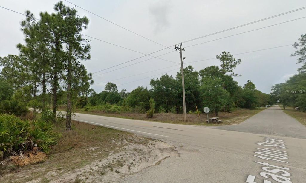 Photo of 1007 E 10th Street, Lehigh Acres, FL 33972 (MLS # C7521846)