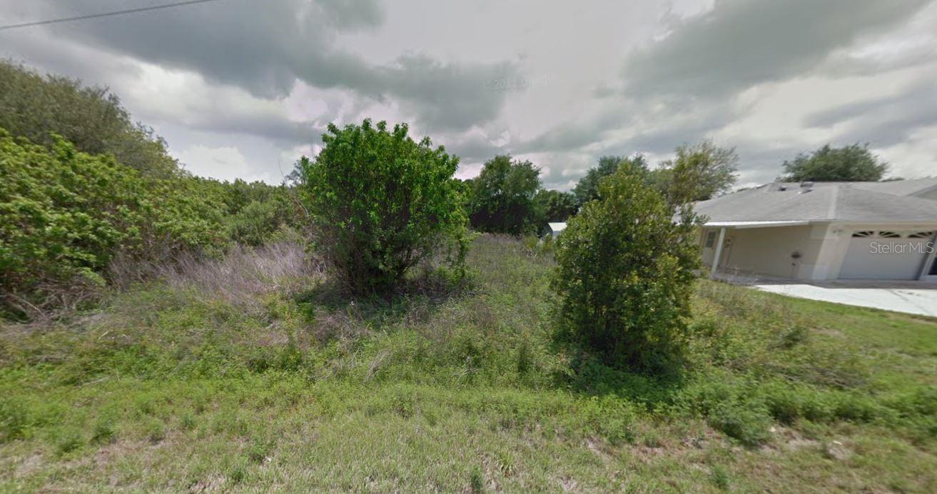 Rarely available waterfront lot in a peaceful and growing area of Port Charlotte! This 0.23-acre property backs directly to a freshwater canal—perfect for kayaking, fishing, or simply enjoying serene water views right from your backyard. Located in a quiet residential neighborhood with new constructions nearby, this lot offers excellent potential for a custom home or investment property. Public water and electricity are available nearby. Don’t miss your chance to own this elusive gem of a waterfront property in one of Southwest Florida’s most desirable markets. Buyer to verify all utility and building information with Charlotte County.