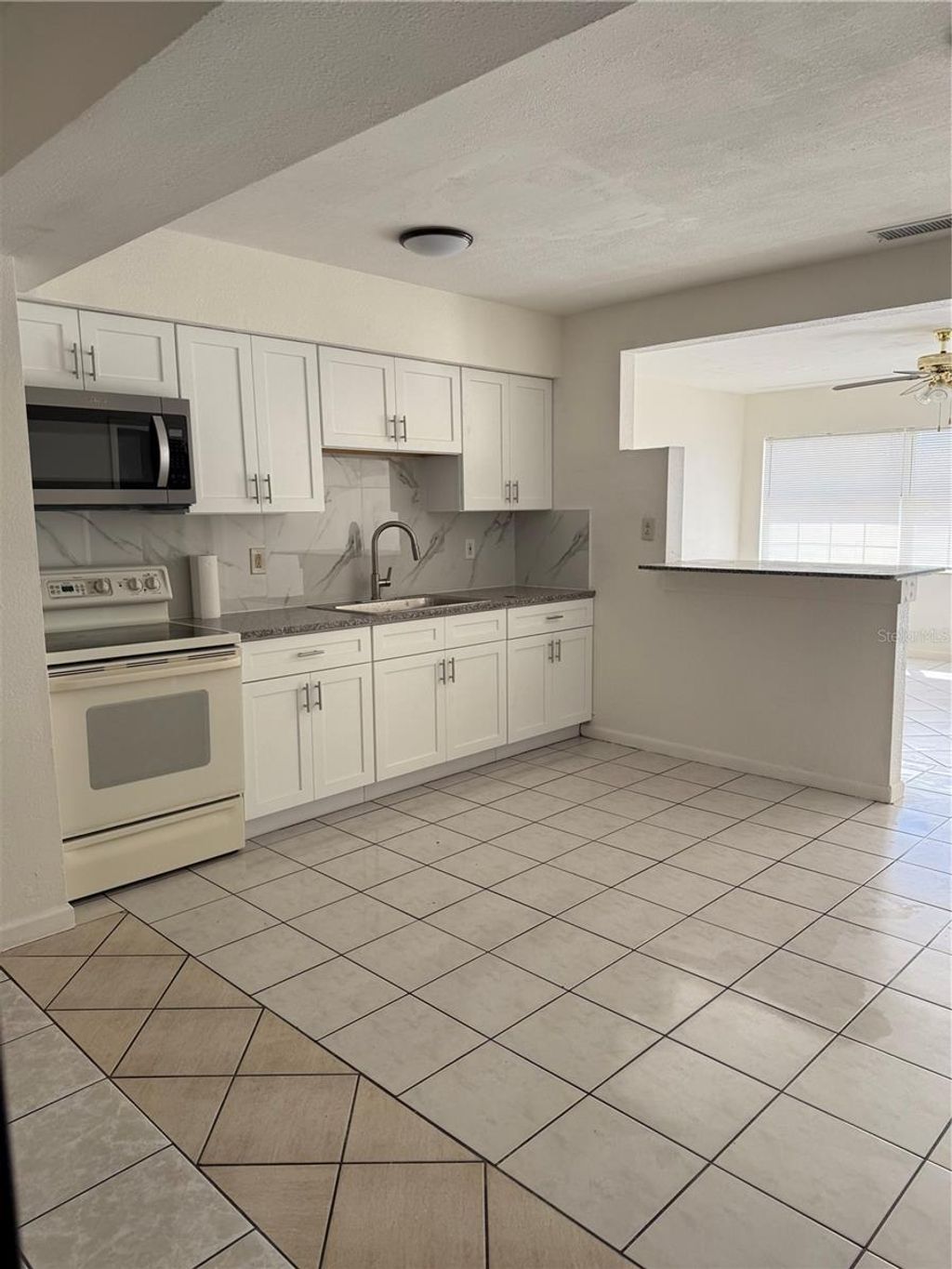 Photo of 4737 56th Avenue N, St Petersburg, FL 33714 (MLS # TB8481011)