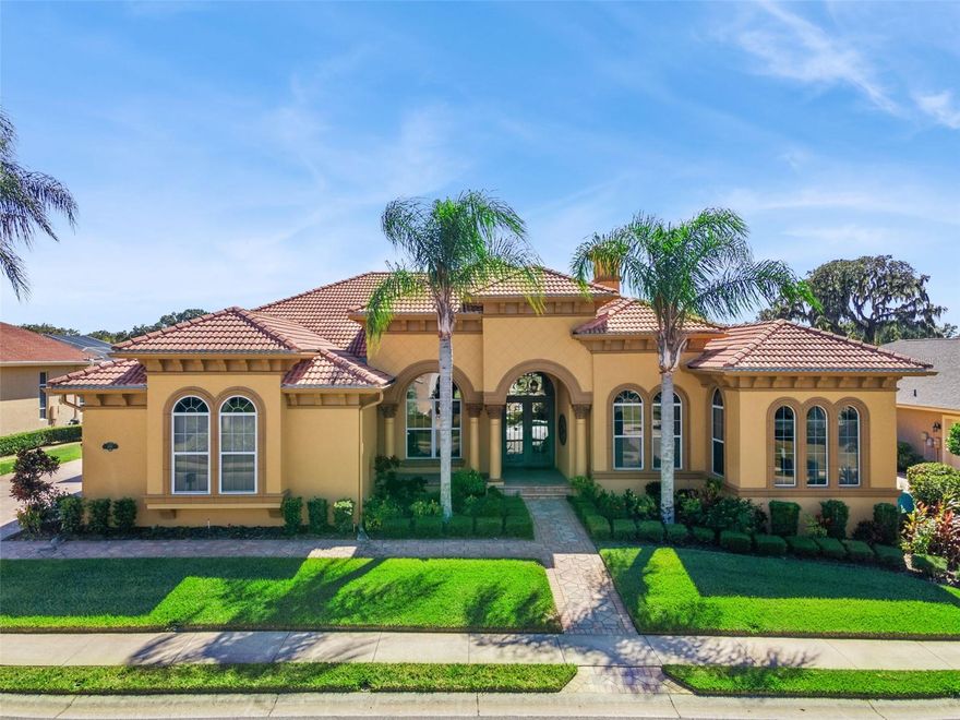 685 Whisper Woods is a carefully maintained 4 bedroom, 3.5 bath home with 4208 square feet blending thoughtful design with premium upgrades throughout.  Situated on the 5th hole of the Eaglebrooke golf course, it is a private retreat in a suburban setting.  When you enter through the raw iron double doors you will notice the custom tile work and crown molding that accents the open living and dining spaces.  The chef's kitchen is a modern design with cherry cabinets, hosting all stainless steel appliances and a generous pantry.  In close proximity a full walkup wet bar.

The owner’s suite features a luxurious bath with a high-end spa shower, jetted tub, and recent granite counters. It extends through to a space perfect for an exercise retreat or nursery. Guest bedrooms provide flexibility, with one optional bay window bonus room perfect for work or relaxation. The laundry area and three full baths are modernized, while closet systems and custom cabinetry enhance storage.


Light flows into the home from insulated, tinted Low-E windows and sliders, leading to an outdoor living area with an extended travertine patio, spa and pool, and a fully equipped outdoor kitchen with an infrared grill and outdoor refrigerator. The home includes a marble gas fireplace in the main living space for the perfect ambiance. Recent upgrades like a beehive smart sprinkler system, fresh paint, rain gutters, newer water heater, Ring security, epoxy garage floor, and custom media storage deliver worry-free, move-in ready comfort.


With its attached 3 car garage, fresh landscaping, and premier location in Eaglebrooke—a gated semi-private golf community featuring tennis, pool, dining, and top-rated schools—this home is functional, luxurious, and distinguished, a perfect fit for those looking for a resort lifestyle in South Lakeland.