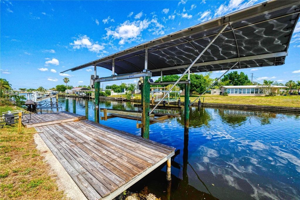 Photo of 835 Conreid Drive NE, Port Charlotte, FL 33952 (MLS # N6144142)