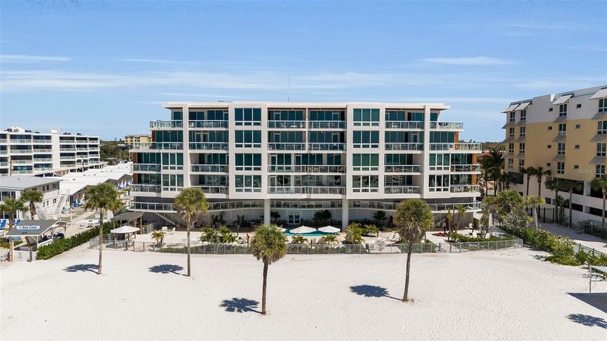 Experience elevated beachfront living at this exceptional residence in Ten35 Seaside, a boutique Gulf-front community on the quiet southern end of Siesta Key. Offering private beach access and a refined modern coastal design, this 2-bedroom, 2.5-bath condominium combines luxury finishes with strong lifestyle and investment appeal.

The open-concept layout is designed for seamless indoor-outdoor living, with a chef-inspired kitchen featuring premium Wolf and Sub-Zero appliances, custom cabinetry, and sleek contemporary finishes. The living and dining areas flow effortlessly to a private terrace, inviting natural light and coastal breezes.

The primary suite offers a private retreat with a spacious walk-in closet and spa-style en-suite bath with dual vanities and a walk-in shower. The guest suite includes its own en-suite bath and custom built-in bunk beds, maximizing functionality and creating an ideal setup for hosting guests or enhancing rental potential.

Ten35 Seaside delivers a boutique resort-style experience with amenities including a beachfront pool and spa, private cabanas, fitness center, and direct beach access. Ideally located just minutes from Siesta Key Village and a short drive to downtown Sarasota, this residence is well-suited as a primary home, seasonal getaway, or income-producing investment.