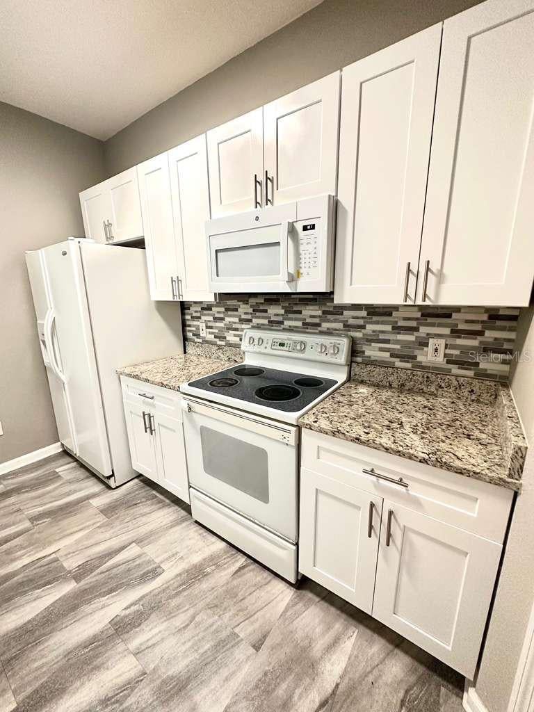 Photo of 13584 Turtle Marsh Loop #130, Orlando, FL 32837 (MLS # S5160144)