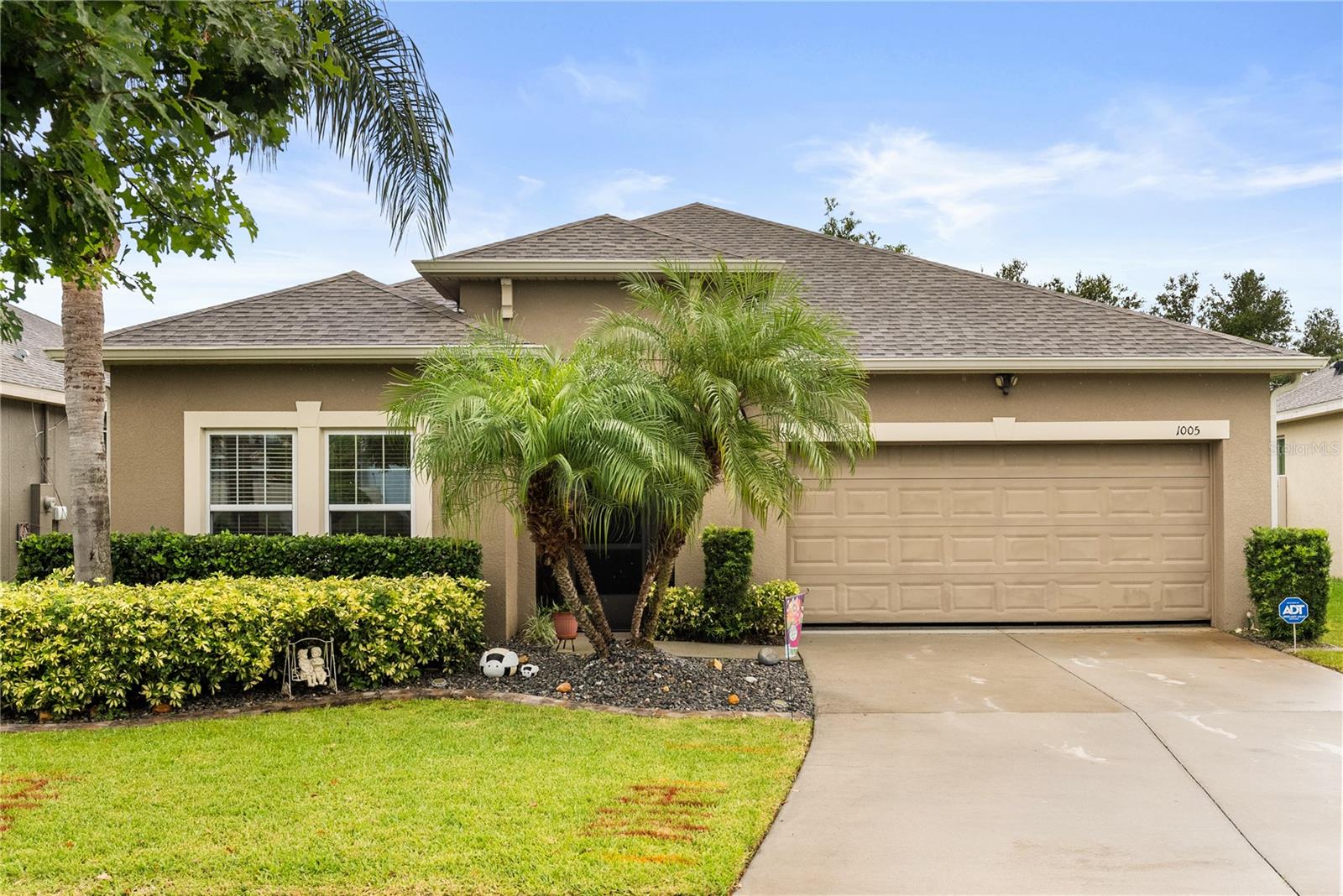 Tucked within a picturesque lakefront community, this beautifully maintained 3-bedroom, 2-bath home is a true Florida gem with standout curb appeal and inviting charm from the moment you arrive.
Step through the welcoming front porch into a bright, open-concept layout that flows effortlessly from the spacious kitchen complete with a large island, stainless steel appliances, and rich wood cabinetry into the cozy dining and living spaces. Perfect for everyday living or entertaining guests!
Love the outdoors? This home shines with a fully screened lanai that feels like an extension of your living space featuring multiple lounge areas, mood lighting, ceiling fans, and roll-down shades for comfort year-round. Just beyond, enjoy your private fenced-in backyard oasis with plenty of room to relax and entertain. Whether you're sipping your morning coffee on the porch or hosting a BBQ under the lights, this home truly captures Florida living at its best. Waterside Pointe is packed with resort-style amenities designed for every lifestyle. Enjoy the beautifully appointed clubhouse, state-of-the-art fitness center, sparkling resort-style pool, multiple playgrounds, and courts for pickleball, basketball, and soccer. The community also features scenic trail that winds around the lake, deal for walking, jogging, biking, or cruising in your golf cart. With private lake access and a location just minutes from local shopping, and dining, this home delivers the perfect balance of comfort, convenience, and waterfront living.