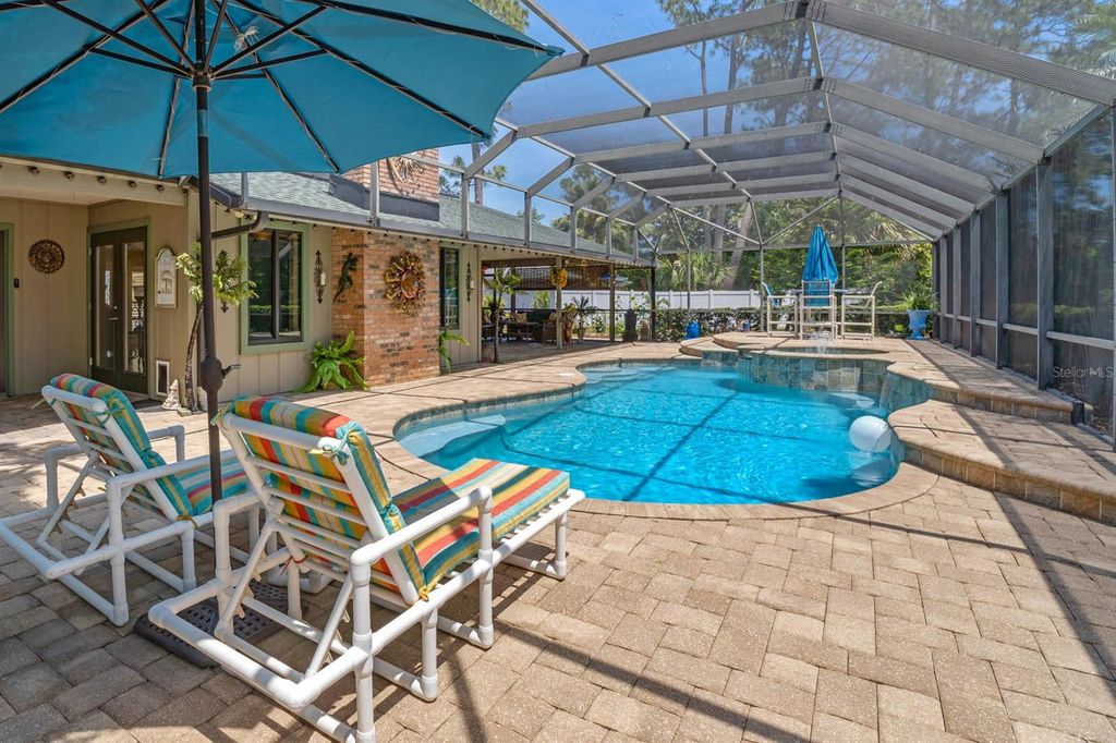 Photo of 114 Sand Pine Place, New Smyrna Beach, FL 32168 (MLS # O6349746)