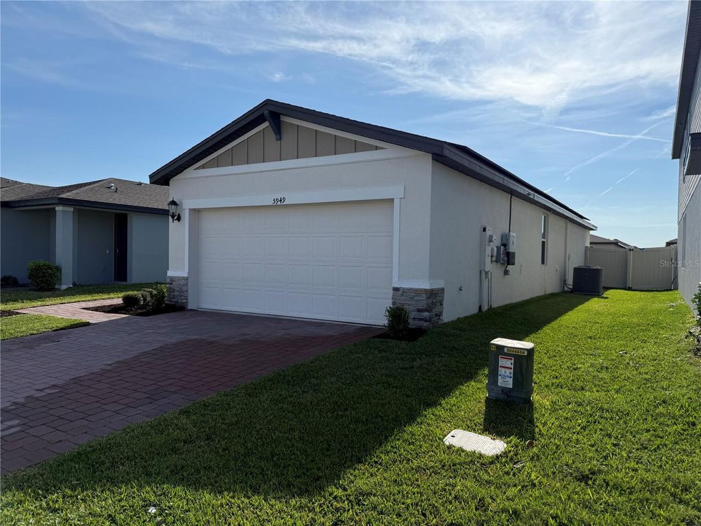 Photo of 5949 Catamaran Ave, Haines City, FL 33844 (MLS # S5139859)
