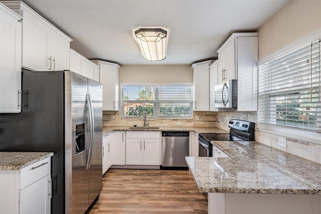 Photo of 10502 Orange Blossom Lane, Seminole, FL 33772 (MLS # TB8445590)