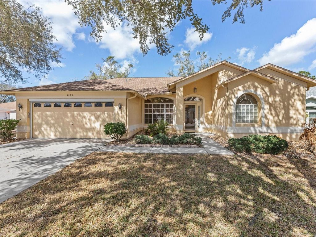Photo of 3123 Quail Hollow Court, Spring Hill, FL 34606 (MLS # W7883115)