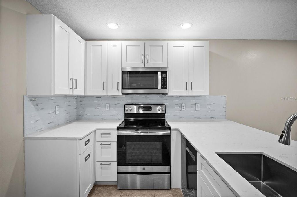 Photo of 4535 Winding River Way, Land O Lakes, FL 34639 (MLS # TB8372405)