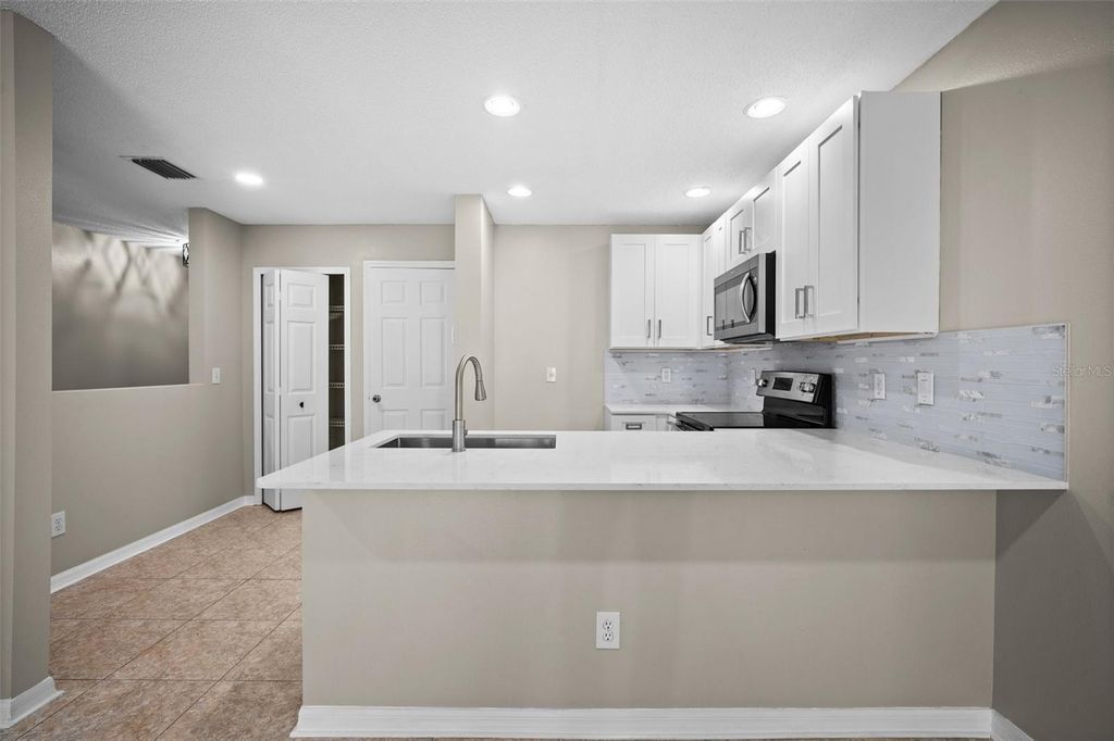 Photo of 4535 Winding River Way, Land O Lakes, FL 34639 (MLS # TB8372405)