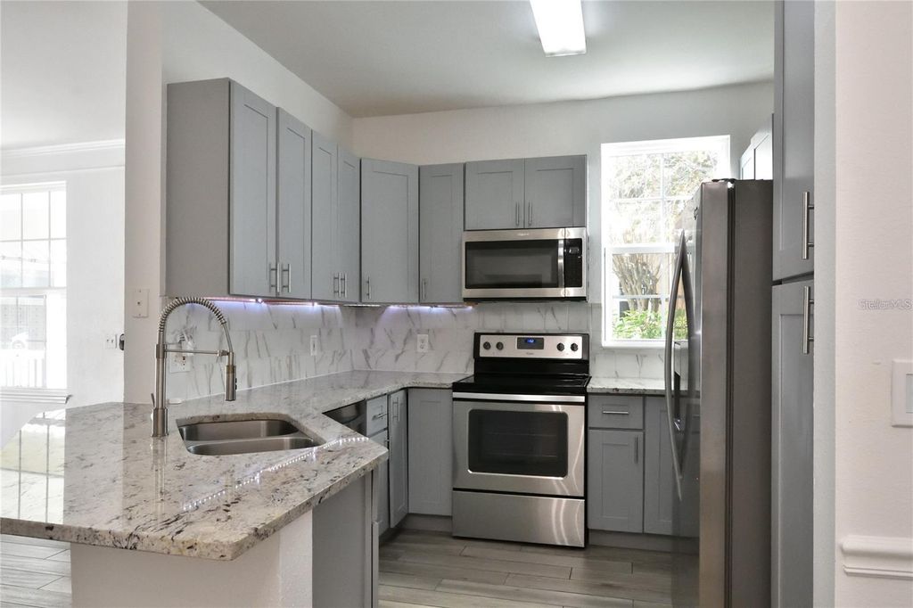 Photo of 3396 Parkchester Square Boulevard #104, Orlando, FL 32835 (MLS # O6372370)