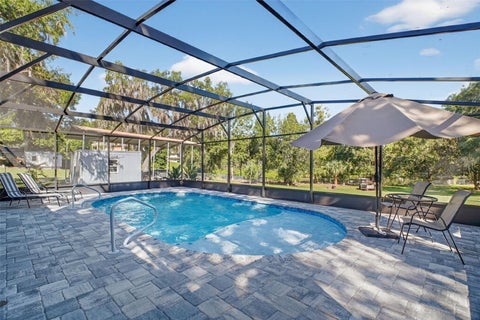 Tiny photo for 11417 Lake Minneola Shores, Clermont, FL 34715 (MLS # GC543538)