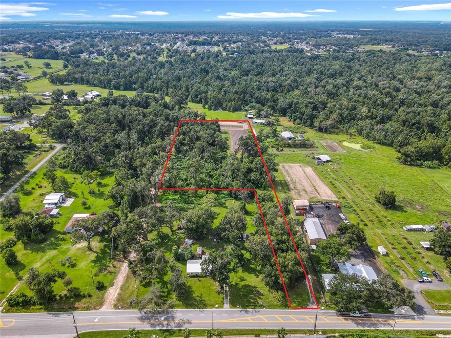 Rare opportunity to own approximately 5 acres in North Lakeland with existing improvements in place. Property includes a well, septic, and a shed. A mobile home is on site; however, it is given no value and is being conveyed as-is.
No HOA and located in Flood Zone X, offering flexibility for a variety of potential uses. Ideal for those looking to build or enjoy space for recreational equipment, boats, or other personal property. Enjoy the privacy and freedom of rural living while still being within convenient distance to nearby shopping, dining, schools, and everyday conveniences.
There are downed trees present on the property. Cash Only. 
Property is being sold strictly as-is with right to inspect. Buyer to verify all property details, including well, septic, zoning, flood zone, and future use.