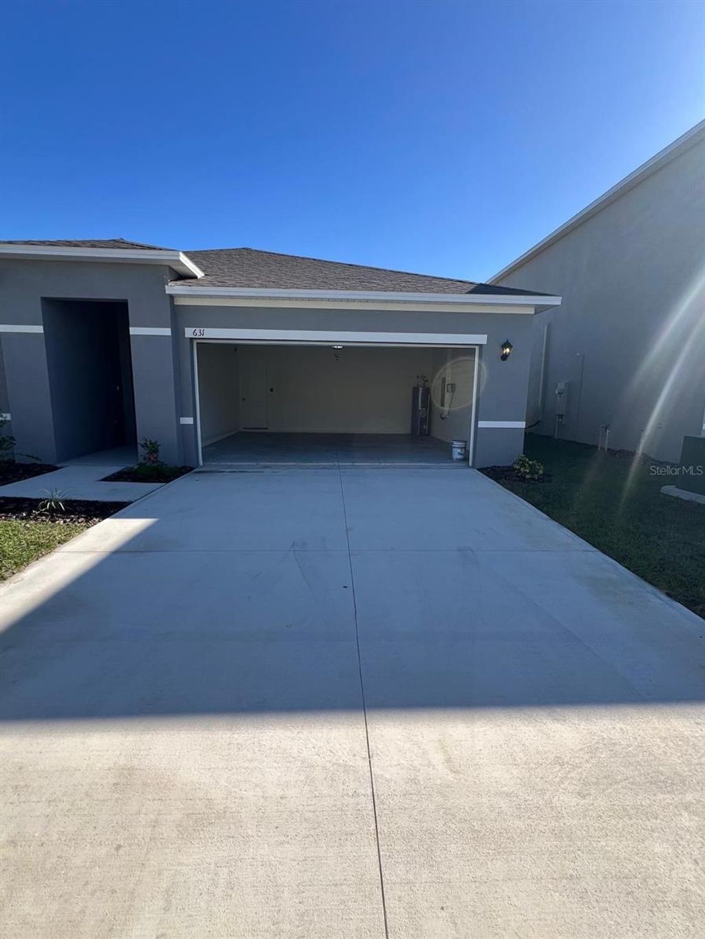 Photo of 631 Park Place Boulevard, Davenport, FL 33837 (MLS # S5148240)
