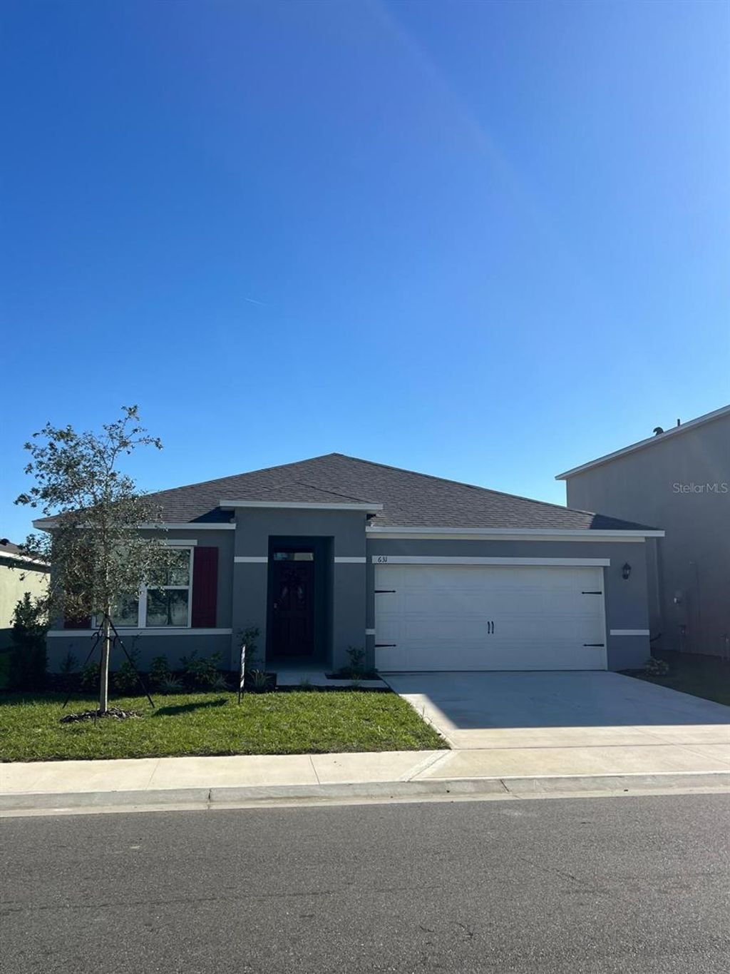 Photo of 631 Park Place Boulevard, Davenport, FL 33837 (MLS # S5148240)