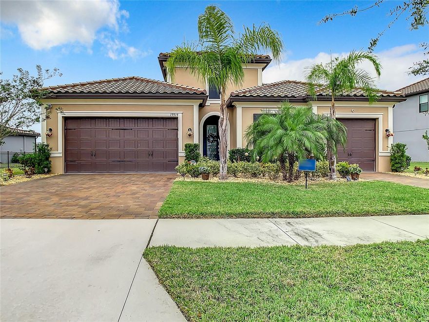 This stunning home is located in the sought-after gated community of Tarramor, in the Odessa/Keystone area. It is conveniently situated within 2 miles of the Upper Tampa Bay Trailhead and the former PGA Tour golf course, TPC Tampa Bay. Tarramor is a luxurious masterplan community surrounded by natural beauty and is home to A-rated schools. The community features paved driveways, tile roofs, immaculate landscaping, and oversized lots, all of which create an atmosphere of upscale living and luxurious elegance.

This spacious single-story home boasts 4 bedrooms, 3 baths, a formal dining room/den with French doors, a 3-car garage, and a relaxing pond view, all sitting on a 1/4 acre of land. The house is in pristine condition, having barely been lived in by the owners, who are frequent travelers. Upon entering the home, you will be greeted by a premium crystaline door and a large, bright, open foyer with 10’ ceilings. The house features LED lighting, wood plank tile, and 5-1/4 crown molding running throughout, with bedrooms that include spotless carpets.

The gourmet kitchen is a culinary dream come true, featuring high-end appliances such as a professional-grade gas range/cooktop with a stainless steel hood vent and a built-in microwave & oven with air fryer features. The kitchen also includes custom extended 42” solid cabinetry with crown molding providing plenty of storage space, soft close hinges, under cabinet lighting, a walk-in pantry, quartz countertops, and a massive island overlooking the great room. The open-concept design ensures the kitchen flows seamlessly into the living area, making it ideal for hosting or enjoying some quality family time. Large windows allow natural light to flood the space, creating a bright and inviting atmosphere. Recessed and pendant lighting fixtures provide additional illumination, highlighting the kitchen's modern and elegant design.

The master suite is a true retreat, featuring a large custom walk-in closet (California Closets), a luxurious en-suite bathroom with split double vanity, a soaking tub, a separate shower, and its own access to the screened lanai. The three other bedrooms are equally spacious, with one en-suite bathroom on its own wing of the house, while the other two bedrooms share a fabulous hall bath.

Outside, you'll find a paved, screened lanai and a large backyard, perfect for enjoying the Florida sunshine. A split three-car garage is ideal for car enthusiasts or storage.

The community amenities include a resort-style swimming pool, a state-of-the-art fitness center, and an expansive clubhouse. The location is conveniently located on Sun Coast Parkway, providing easy access to Tampa and beyond. Local attractions and amenities include numerous golf courses, local restaurants, Tampa Premium Outlets, and more. This house is a great place to call home!