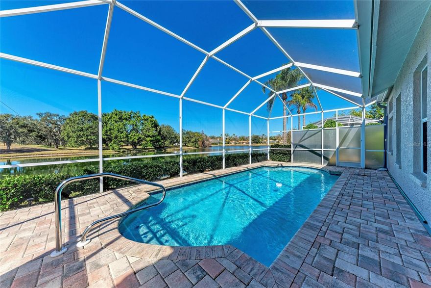Beautifully upgraded pool home on a premium lot in Lakewood Ranch with pond and golf course views. Love the lake view !!! Turn-key or furnish yourself.
~~THE HOME THAT CHECKS ALL THE BOXES~~
INTERIOR FEATURES:~ High ceilings, bright and open~ Consistent vinyl flooring throughout~ Updated kitchen with granite Countertops~ Stainless steel appliances ~Master suite with large walk-in closet~ Custom closet systems throughout~ OUTDOOR LIVING~ Extended screened lanai~ Heated sizable pool~ Serene pond and golf views~ Very private setting~ LOCATION AND LOW HOA~ Three minutes to Main Street~ No Lakewood Ranch CCDs~ No development or club fees~ No required golf fees~ Total HOA is $208/month (covers exterior landscaping, mailboxes, etc.)
ADDITIONAL HIGHLIGHTS: Arthur Rutenberg design with excellent use of space~ Available furnished or unfurnished ~Ideal for full-time living, Seasonal use, or Turnkey Investment.