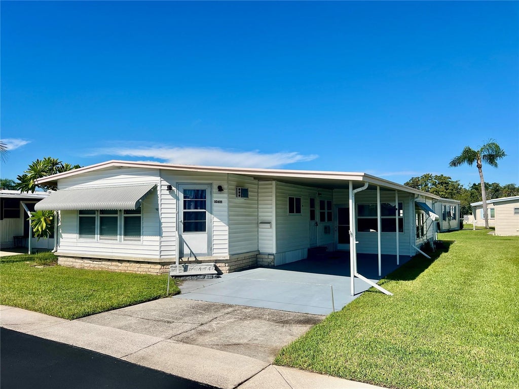 Photo of 10811 Freedom Drive, Port Richey, FL 34668 (MLS # W7890180)