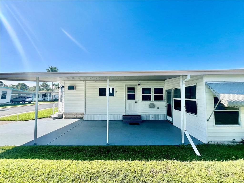 Photo of 10811 Freedom Drive, Port Richey, FL 34668 (MLS # W7890180)