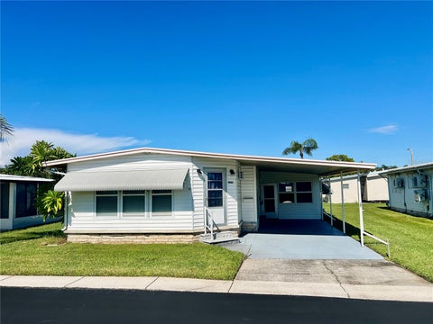 Photo of 10811 Freedom Drive, Port Richey, FL 34668 (MLS # W7890180)