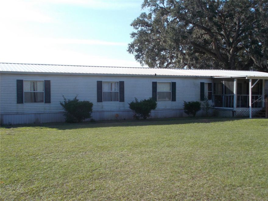 Great country home at a fantastic price! This spacious 4-bedroom residence sits on nearly an acre with no HOA, offering freedom and privacy. Inside, you’ll find over 2,000 square feet of living space, a convenient inside laundry room, and a flexible 4th bedroom that could serve as a home office or cozy den. The primary suite boasts a large en suite bath with a garden tub and separate shower. A newer roof and AC provide peace of mind, while the additional 30' x 10' screened porch opens up endless possibilities—it could become an outdoor kitchen, a garage, or a carport. With plenty of room for large or extended families, this property is perfect for anyone who wants space to spread out. With a little TLC, this home would be a fantastic buy! Close to major roads for easy commuting and right across the street from Leesburg Bike Trail. This property does need a new well, but that’s an opportunity to make it your own. Call today for details—this one won’t last! Professional Photos coming next week.