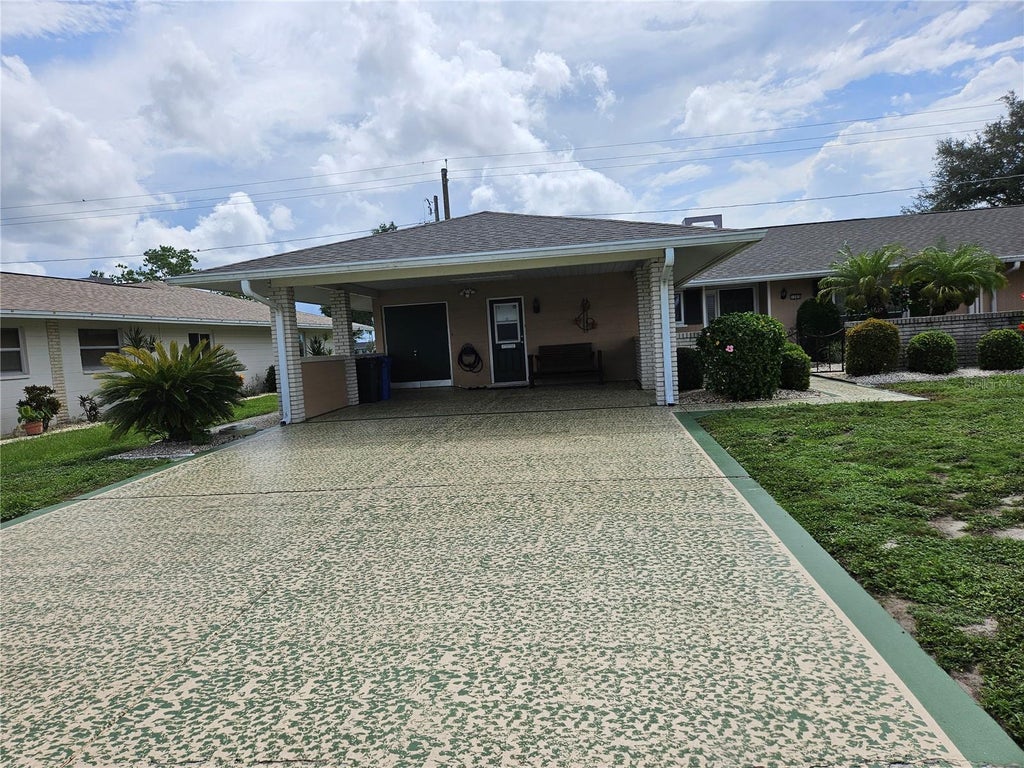 Photo of 1505 N Pebble Beach Boulevard, Sun City Center, FL 33573 (MLS # TB8535039)