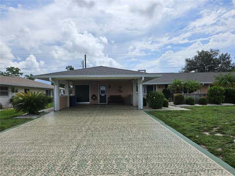 Photo of 1505 N Pebble Beach Boulevard, Sun City Center, FL 33573 (MLS # TB8535039)