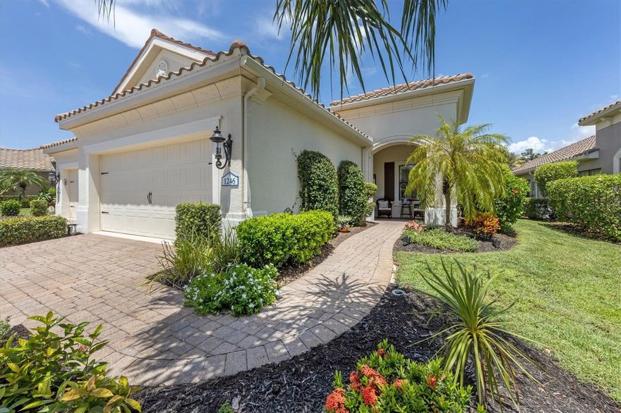 Take advantage of this new $30K PRICE IMPROVEMENT, new HVAC system, and appliances! Welcome to this exquisite custom-designed villa nestled in the heart of an amenity-rich gated community, offering a luxurious and comfortable lifestyle. This stunning property boasts a beautiful private backyard, complete with a charming open-air patio where you can bask in the tranquility of your surroundings. As you step inside, you'll immediately be captivated by the elegance and attention to detail. Crown molding graces the ceilings, adding a touch of sophistication to the ambiance. The kitchen is a chef's dream, natural gas cooking, featuring gorgeous granite counters, a stylish tile backsplash, and sleek tile flooring that seamlessly tie the space together. This villa offers a well-thought-out layout, featuring 2 spacious bedrooms that provide a serene retreat for relaxation. The owners suite is a true haven, offering an en-suite bathroom for added convenience and 2 closets. A study-den provides the perfect space for a home office or a cozy reading nook, allowing for versatility in how you utilize this charming villa. The front and rear patios provide enchanting outdoor spaces, perfect for enjoying your morning coffee or hosting intimate gatherings under the open sky. Designer light fixtures throughout and custom built features add a touch of elegance to every corner. On the exterior, Storm Smart shutters provide a safe envorinment and paver driveway and outdoor coach lighting welcome you home. You'll enjoy the benefits of living in a community that offers a full-time activity coordinator, ensuring there's never a dull moment. Dive into a world of leisure with access to 3 community pools, a club house, fitness center, tennis and pickleball courts, and even a splash park for the young at heart. For those who love the outdoors, miles of walking and biking trails await, allowing you to explore the natural beauty of the surroundings. And when you're in the mood for a change of scenery, historic downtown Venice is just a stone's throw away, offering a charming blend of culture, dining, and entertainment. Don't miss your chance to own this exceptional custom villa in a community that truly has it all. Embrace the luxurious lifestyle, unparalleled amenities, and the convenience of a prime location. Your dream home awaits.