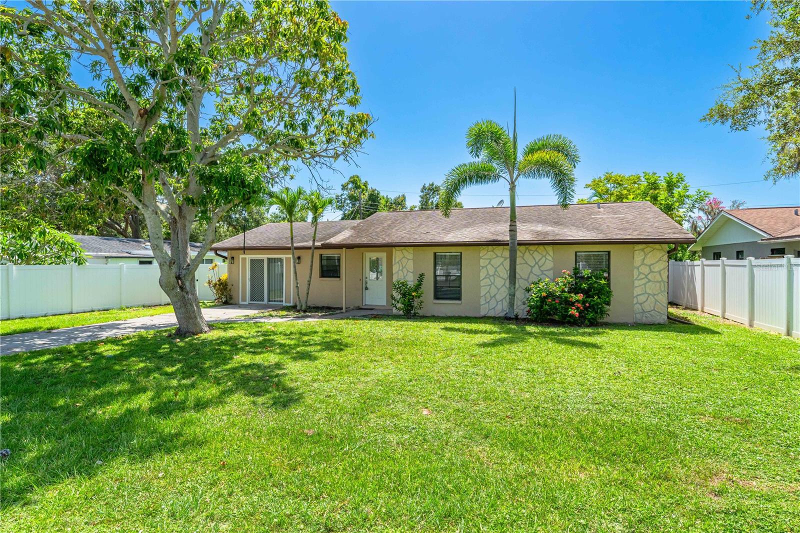 This is the One! *Newly updated 3-bedroom, 2-bath home featuring a light and bright kitchen and bathrooms*Enjoy granite countertops, brand-new flooring throughout, and a spacious living/dining room combo perfect for gatherings*The property boasts a fenced, oversized backyard, ideal for pets, play, or entertaining*With no deed restrictions and no HOA fees, you’ll have the freedom and flexibility to use the property as you wish*This home also remained high and dry during recent flooding events, providing added peace of mind*Conveniently located less than 10 minutes from World-Famous Siesta Key Beach and just 5 minutes from the popular Detwiler’s Farm Market, this home offers the perfect blend of comfort, location, and lifestyle*