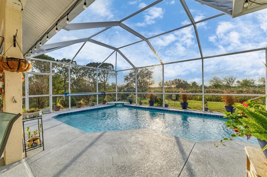 Photo of 1057 Meadow Breeze Lane, Sarasota, FL 34240 (MLS # A4661232)
