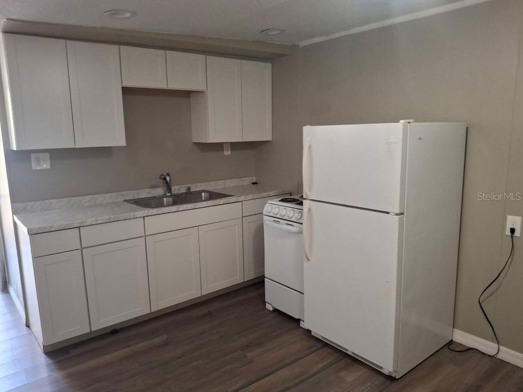 Photo of 9109 Sunshine Boulevard, New Port Richey, FL 34654 (MLS # TB8461404)