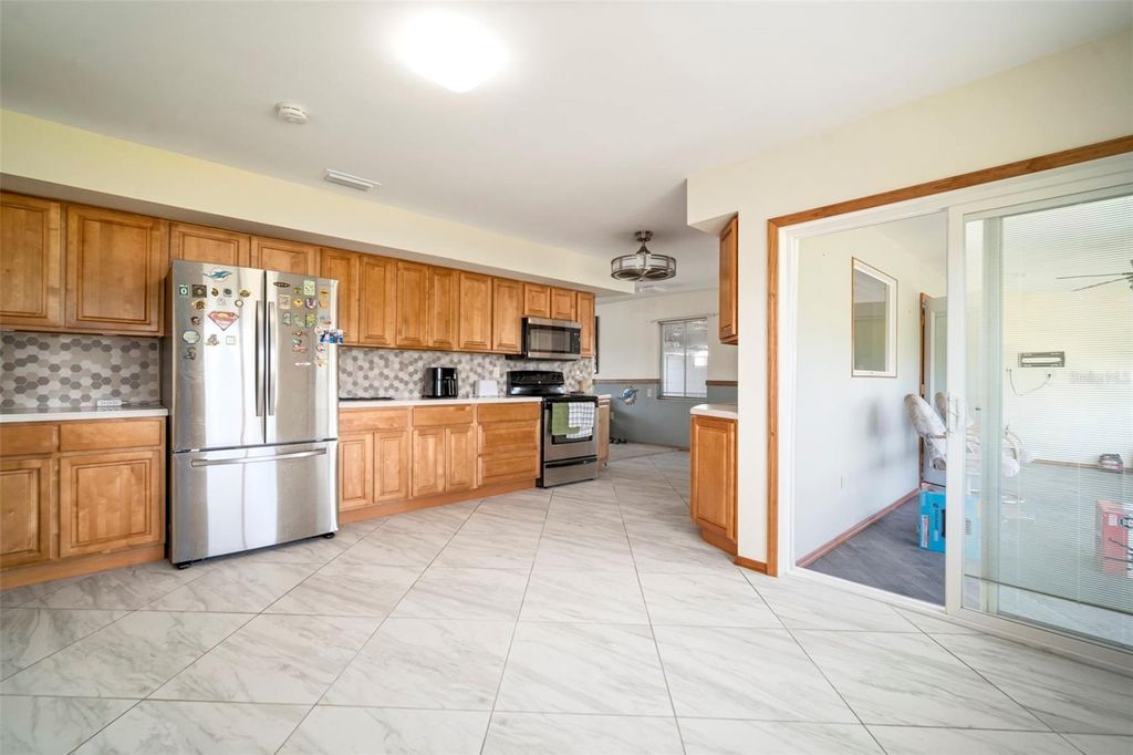 Photo of 609 Fox Hills Drive, Sun City Center, FL 33573 (MLS # TB8432588)